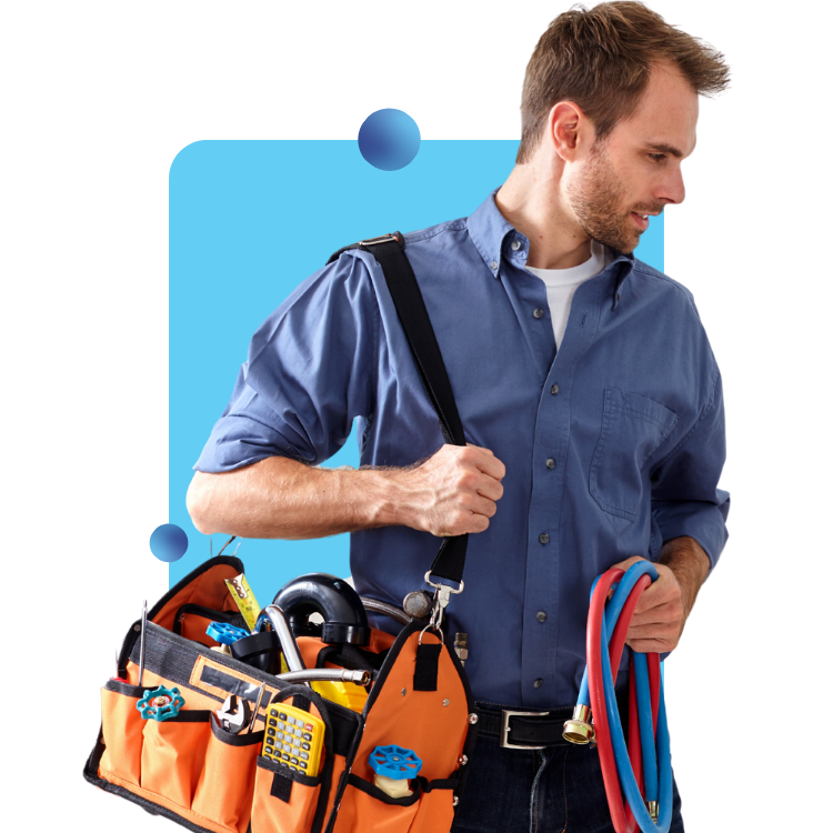 A home contractor holds water piping and wears a tool bag over his shoulder